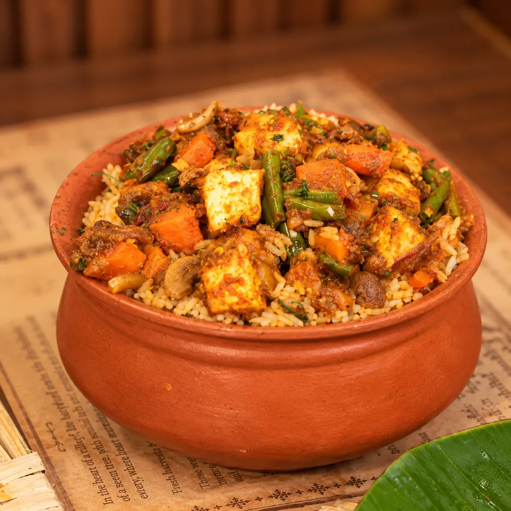Khazana veg biryani in a clay pot